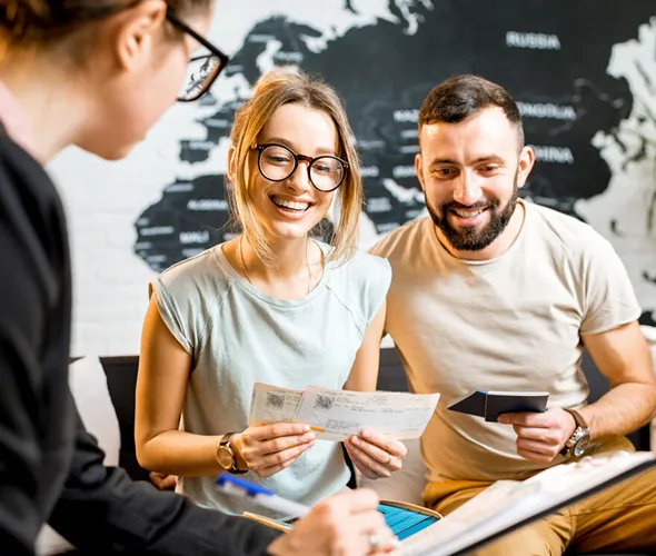 Tour agent guiding tourists through an affordable and informative travel plan.